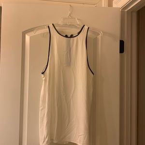 White and black sleeveless top